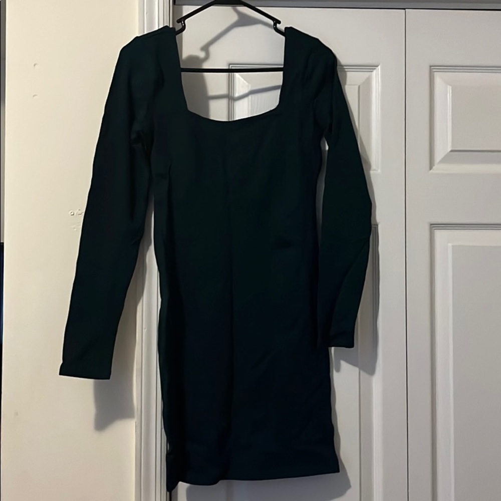Dark green body con dress